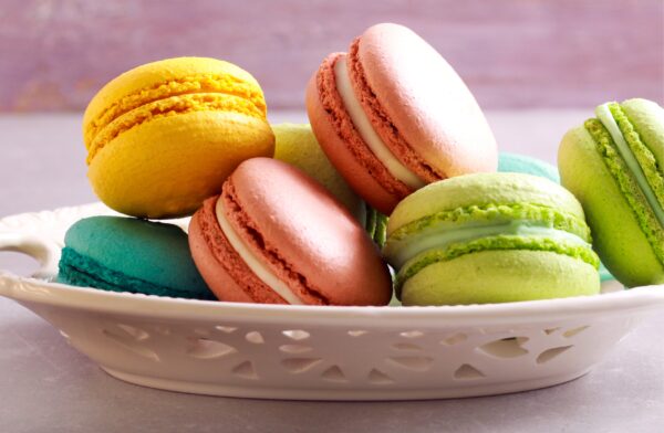 Colorful macarons in a bowl
